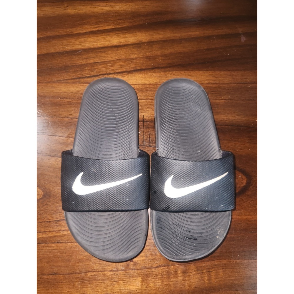 Nike Kawa slides Black with logo swoosh. Kids size 13C
